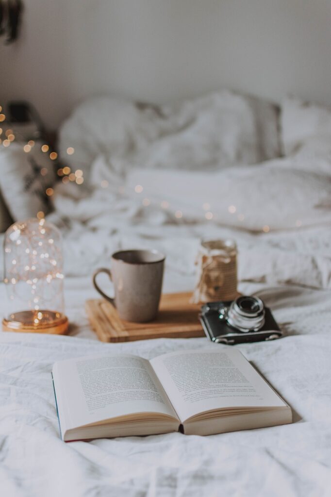 camera, book, candle