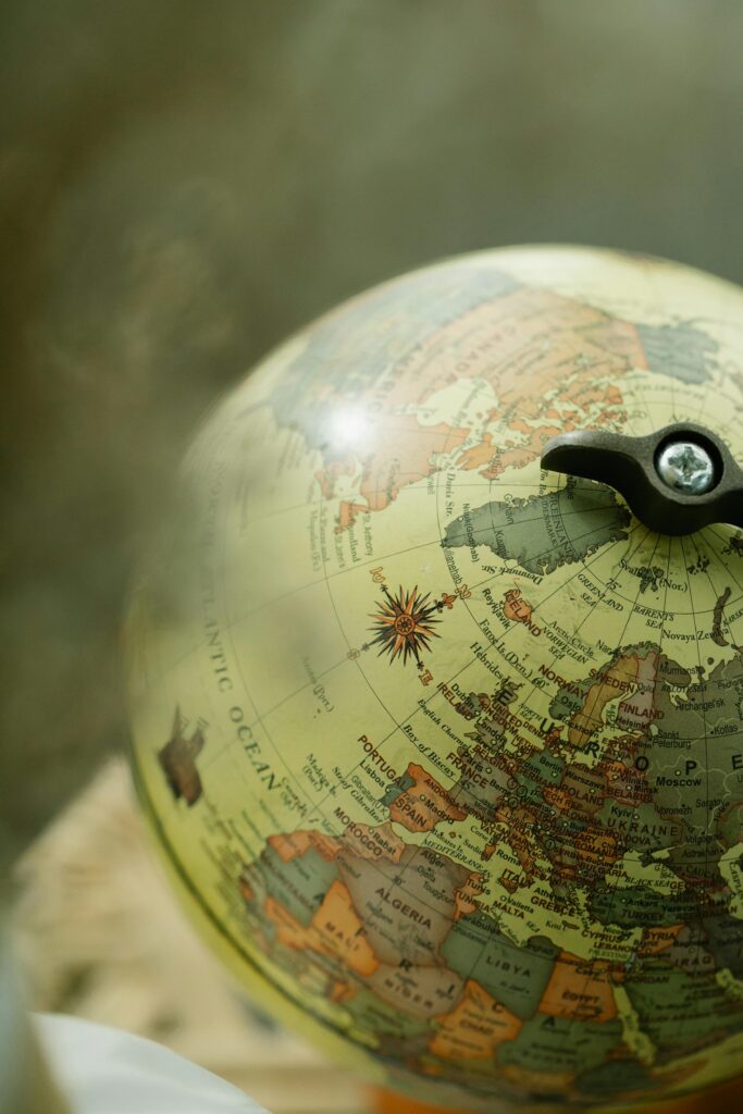 A vintage globe displaying Europe and Africa, capturing geographic details with a nostalgic vibe.